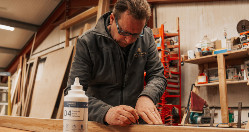 joinery expert craftsman measuring timber